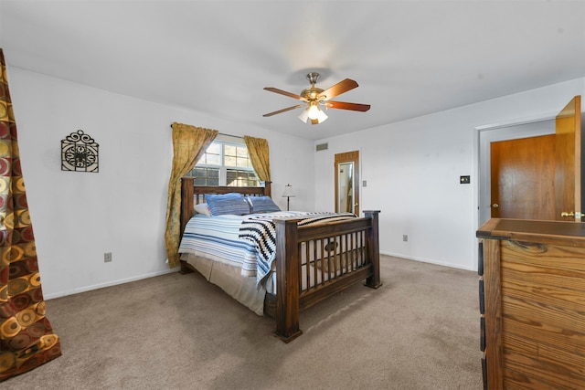 bedroom featuring ceiling fan and carpet floors