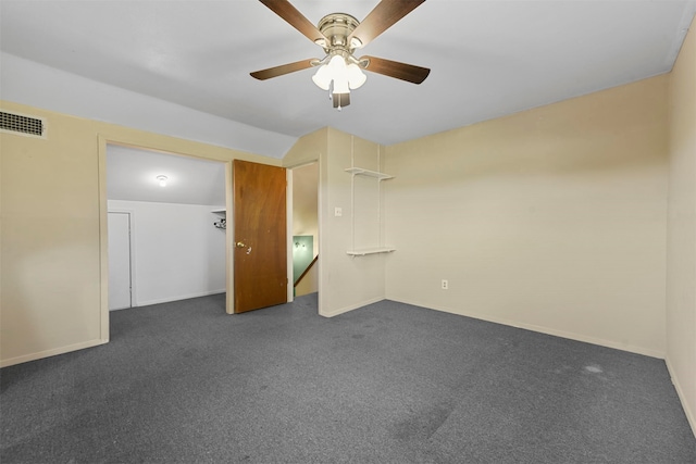 carpeted empty room featuring ceiling fan