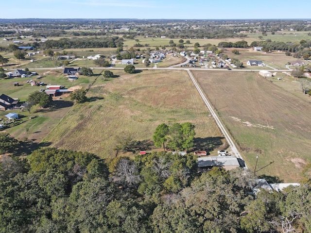 birds eye view of property featuring a rural view