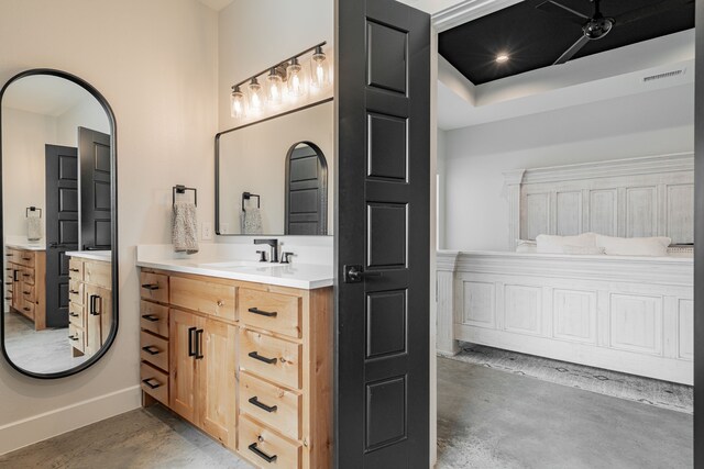 bathroom with vanity, visible vents, and concrete flooring