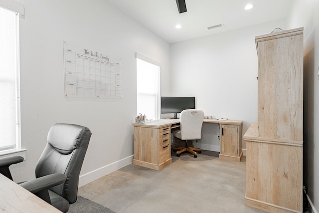 office featuring visible vents, recessed lighting, concrete floors, baseboards, and ceiling fan