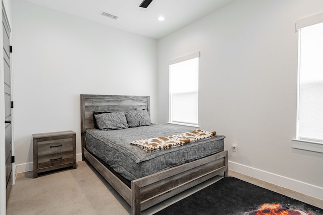 bedroom with a ceiling fan, recessed lighting, baseboards, and visible vents