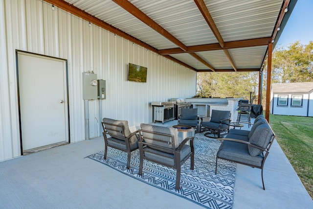 view of patio with an outdoor fire pit