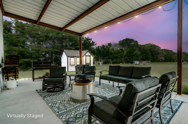 view of patio / terrace with an outdoor kitchen and a grill