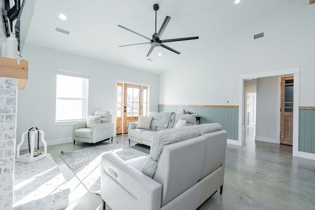 living area featuring visible vents, recessed lighting, and finished concrete floors