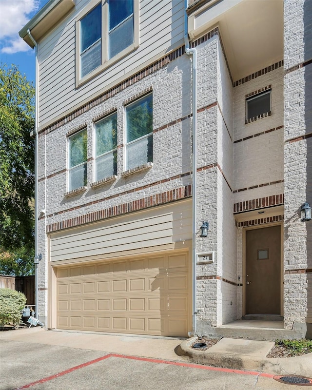 view of front of property featuring a garage