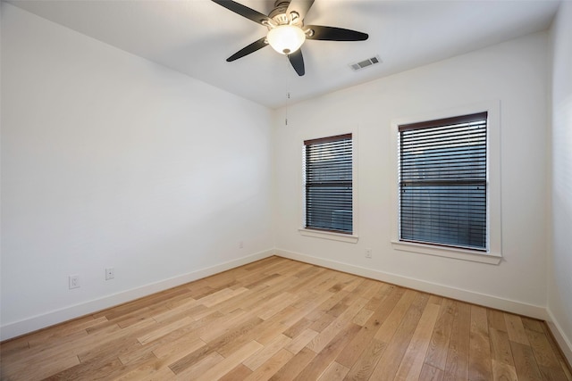 unfurnished room featuring ceiling fan and light hardwood / wood-style floors