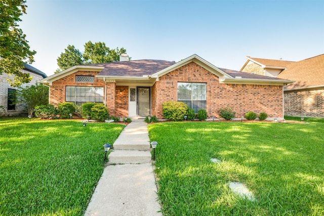 ranch-style house with a front yard