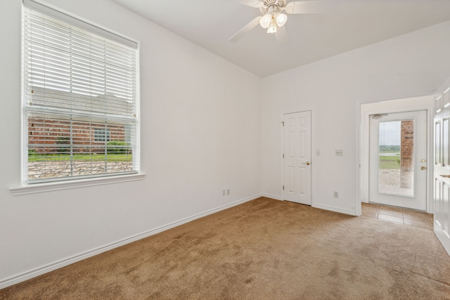 empty room with carpet and ceiling fan