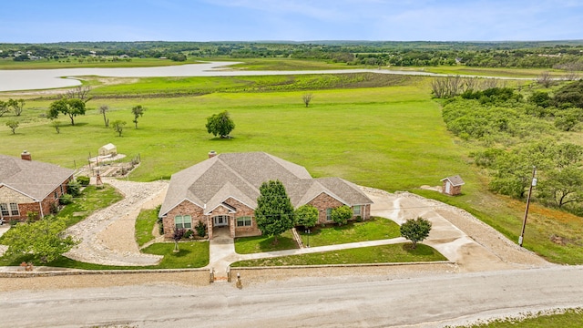 birds eye view of property with a rural view