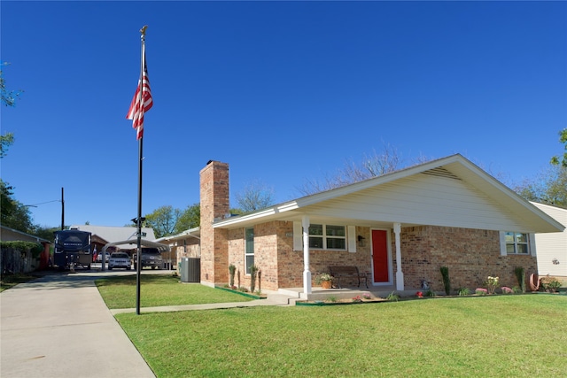 ranch-style home with a front lawn and a carport