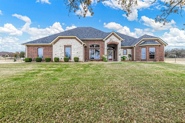 view of front of home featuring a front lawn