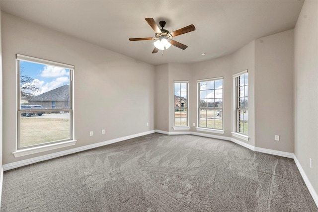 carpeted empty room with ceiling fan