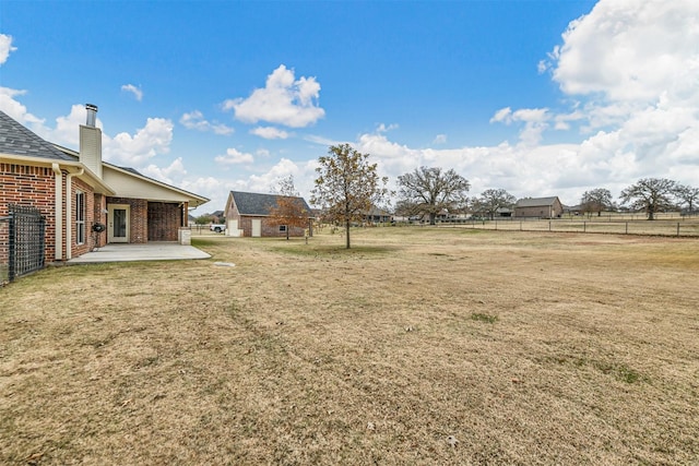 view of yard with a patio area