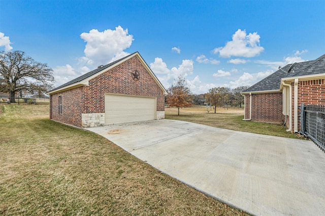 view of side of home with a yard and central AC