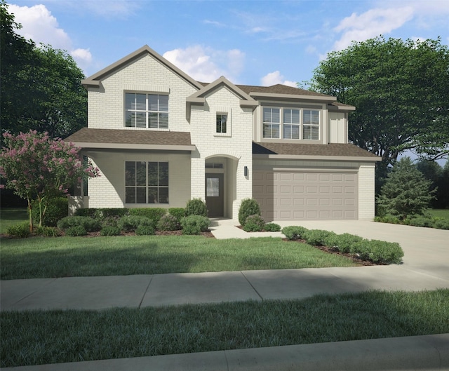 view of front of home with a front yard and a garage