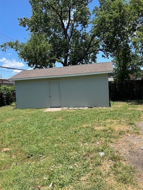 view of outdoor structure featuring a yard