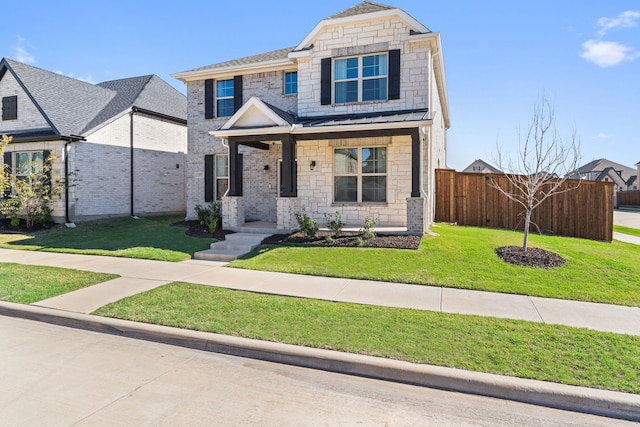 view of front of home featuring a front yard