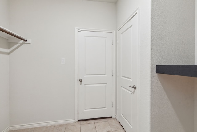 interior space with light tile patterned flooring