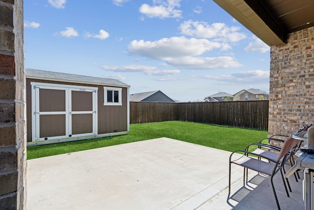 view of patio with a storage unit