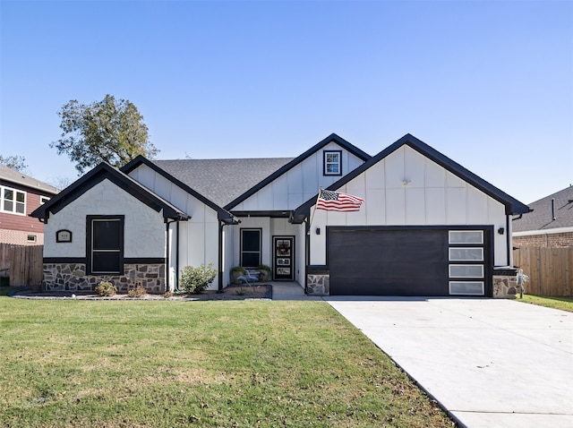 modern farmhouse style home with a garage and a front lawn