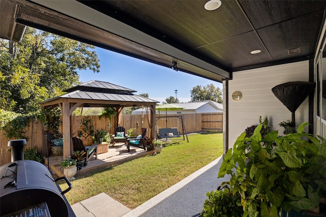 view of patio / terrace with a gazebo and a wooden deck