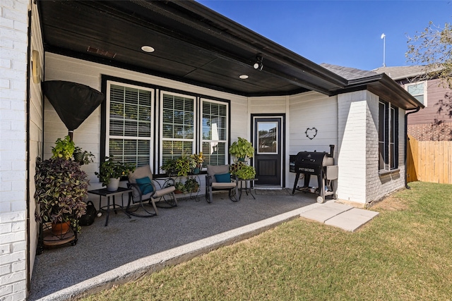 view of patio / terrace featuring a grill and covered porch