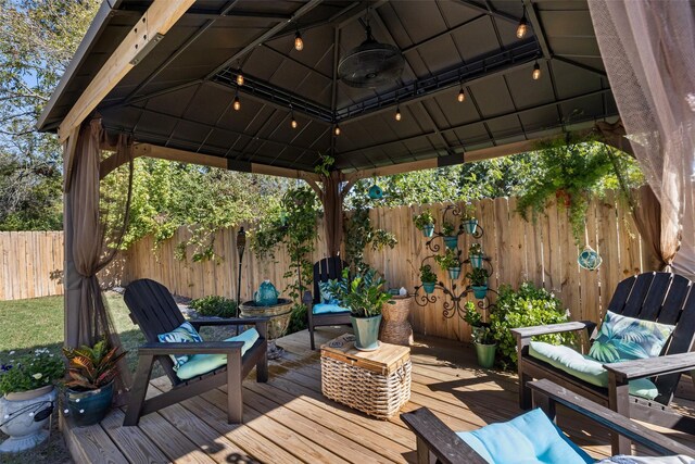 wooden deck with a gazebo