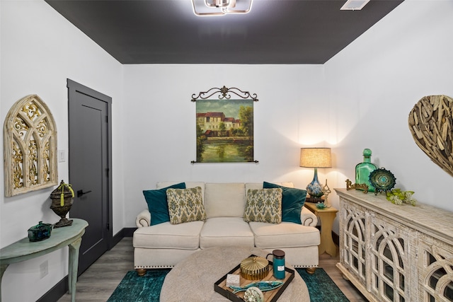 living room featuring dark hardwood / wood-style floors