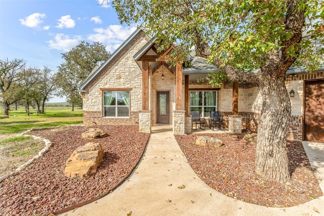 view of front of house with a patio area