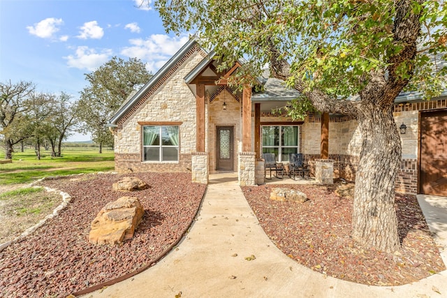 view of front of house with a patio area