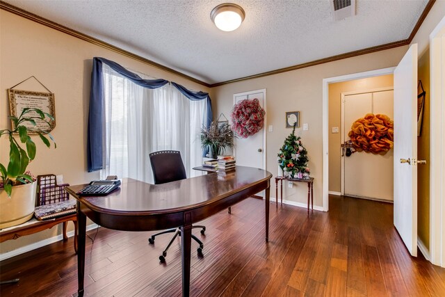 office with dark hardwood / wood-style flooring, a textured ceiling, and crown molding