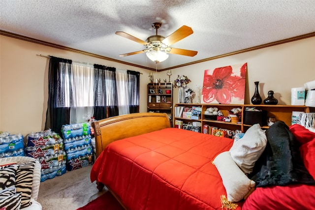 bedroom featuring carpet, a textured ceiling, ceiling fan, and crown molding