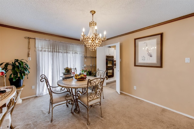 dining area featuring a textured ceiling, light colored carpet, and crown molding