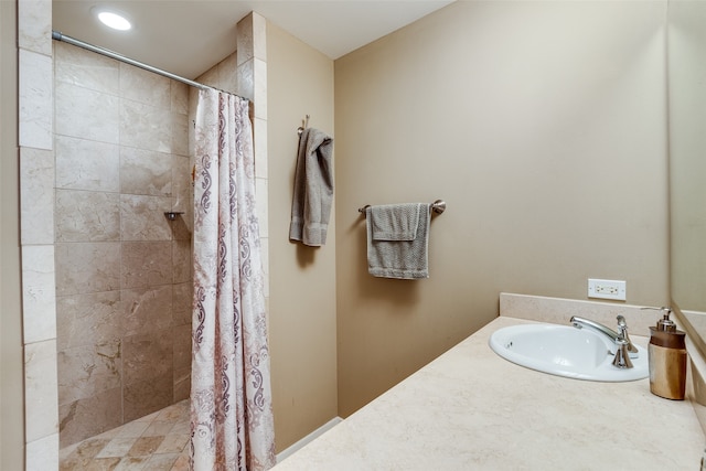 bathroom featuring vanity and walk in shower