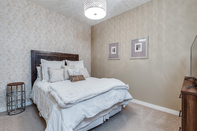 bedroom with light colored carpet