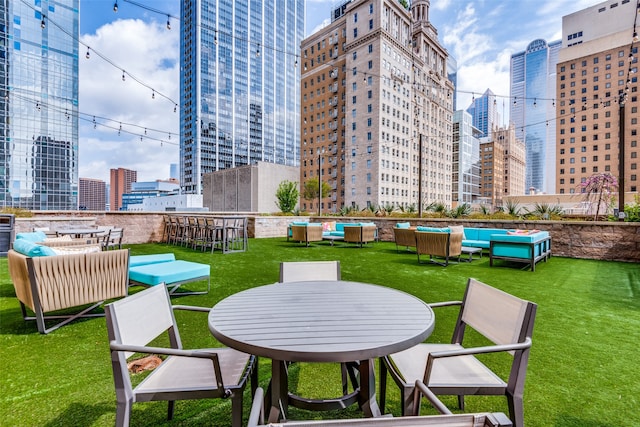 view of patio with an outdoor hangout area and an outdoor bar