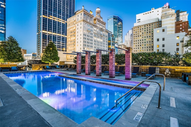 view of pool featuring a patio