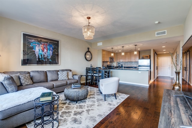 living room featuring dark hardwood / wood-style flooring