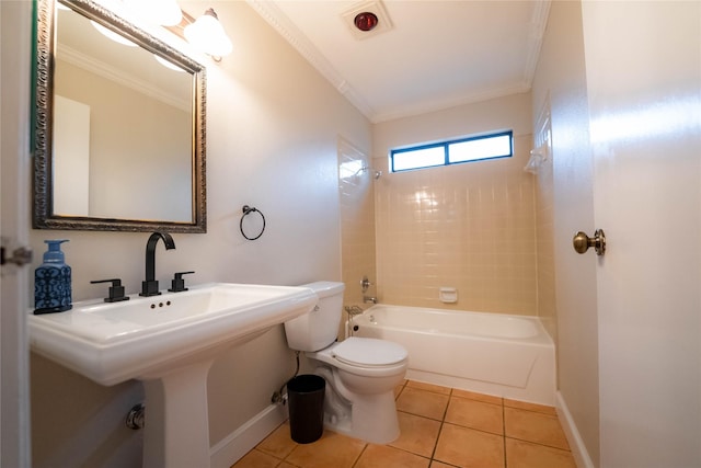 bathroom featuring toilet, tile patterned flooring, crown molding, and washtub / shower combination