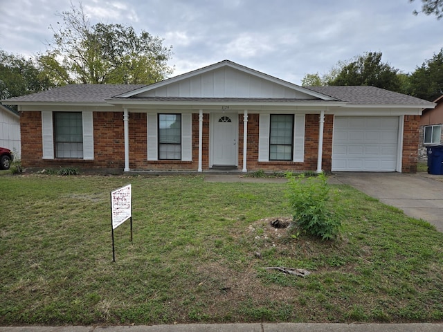 ranch-style house with a garage and a front lawn