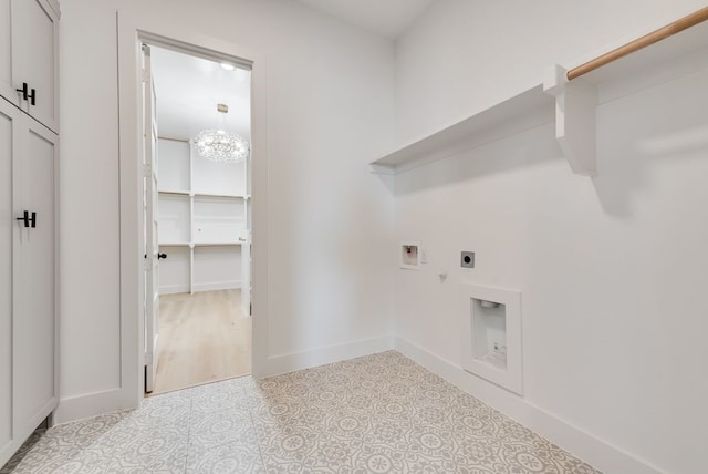 washroom with baseboards, laundry area, washer hookup, and hookup for an electric dryer