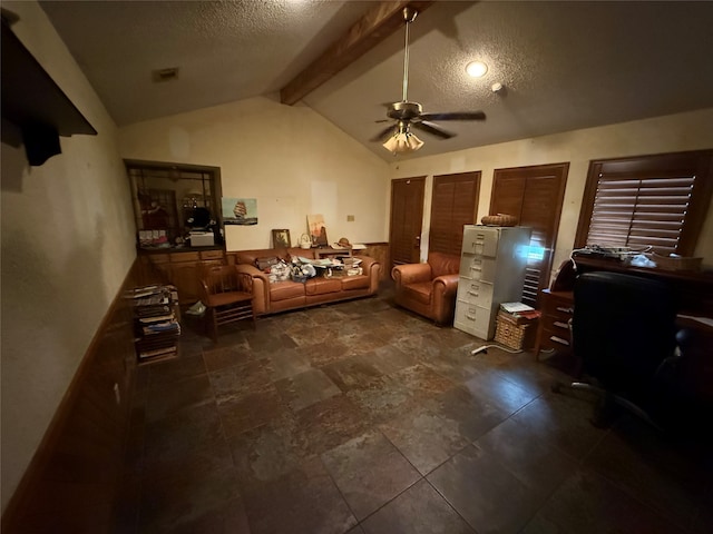 home office with a textured ceiling, vaulted ceiling with beams, and ceiling fan