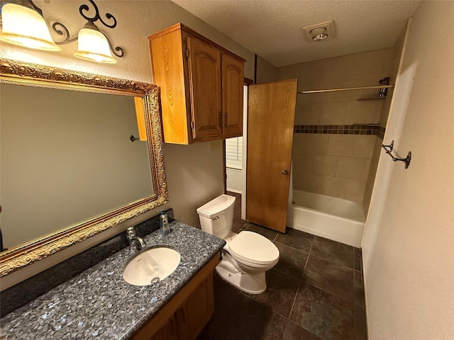 full bathroom featuring shower / tub combination, toilet, a textured ceiling, and vanity