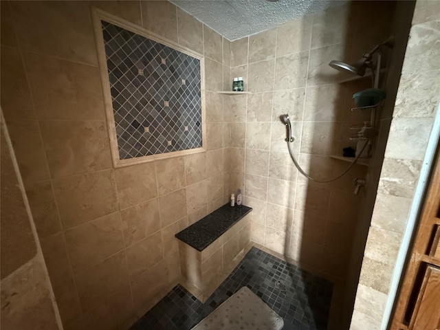 bathroom featuring a tile shower