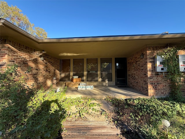 rear view of house featuring a patio area