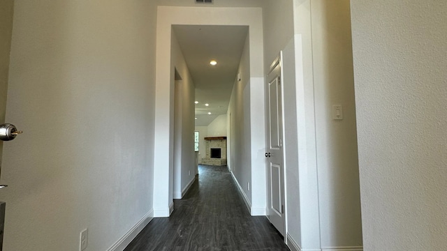 corridor with dark wood-type flooring