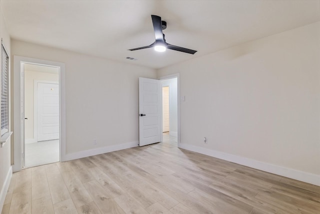 unfurnished bedroom featuring light hardwood / wood-style flooring and ceiling fan