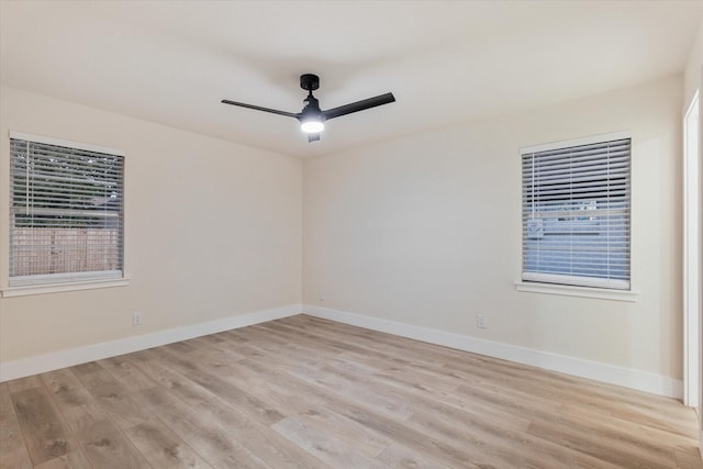 spare room featuring ceiling fan and light hardwood / wood-style floors