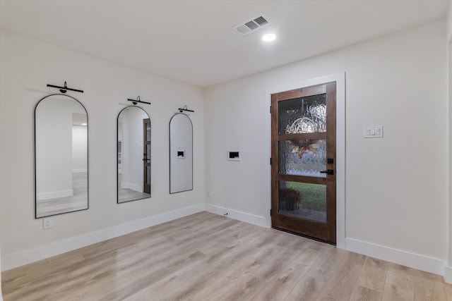 entrance foyer featuring light hardwood / wood-style floors